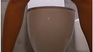 Public Toilet Pissing In Tights And Beautiful Dress