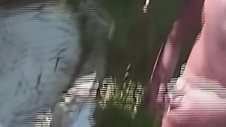 Ebony Babe Takes on Multiple Black Men in Outdoor Gangbang