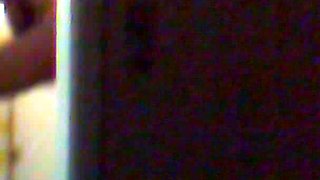 Hidden surveillance in the bathroom of an ebony woman with a nice body