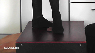 The Slave's Orgasm Under Mistress Cleo's Stocking Feet