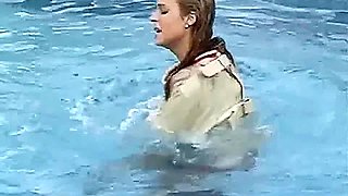 Meche Miley straitjacketed in pool