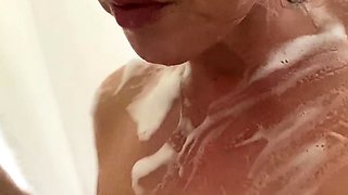 Brunette with big boobs and ass toys her wet cunt