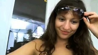 Brunette Flashes Webcam by the Pool