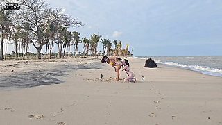 TWO LESBIAN CHICKS PLAYING ON THE BEACH GOT PICKED UP BY A TOURIST AND HAD THEIR ASSES FUCKED