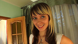 Flora with big tits caresses herself in front of the camera