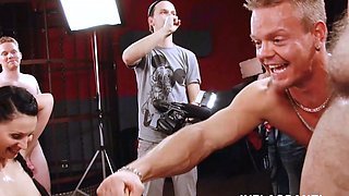 A blonde and a brunette getting gangbanged