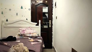Cute amateur asian web cam girl playing with her toy