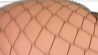 Horny MILF in Fishnets Devours Her Dildo