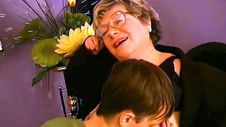 Russian granny teacher with young stud