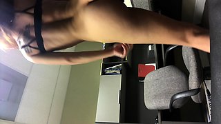 Sneaking away at her office job