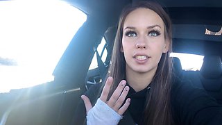 Long-haired beauty indulges in solo car ride