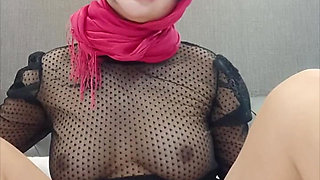 A Woman Wearing a Headscarf Passed by Herself in Her Bed