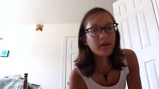 Skinny Brunette with Glasses Strips on Webcam