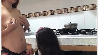 Stepmom straps on and fucks in the kitchen