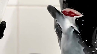 Rubber Slut Swallowing and Bathing in Milk