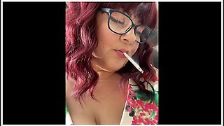 Sweet secretary smoking, alluring and teasing