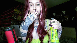 Sexy Alternative Redhead Drinking Soda and Burping