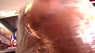 Plastic Wrapped Slut Gaping Wide Through Shiny Film