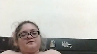 Masturbating