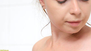 Teen Masturbates Using the Shower Jet