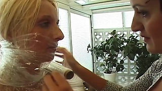 Plastic Wrapped Blonde Slut Encased and Teased Relentlessly