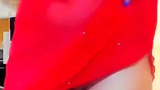 Busty Brunette's Striptease in Sexy Red Dress