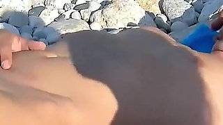 Milf Debora is approached by a stranger and fucked on the beach and her boyfriend is next to her