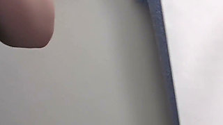 Busty Redhead in Glasses Films Herself Naked in the Bathroom Mirror
