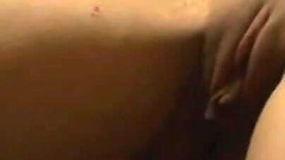 Petit girl stretching, candle dripping