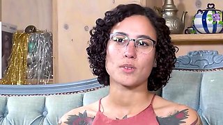 Tattooed black-haired masturbates with her fingers